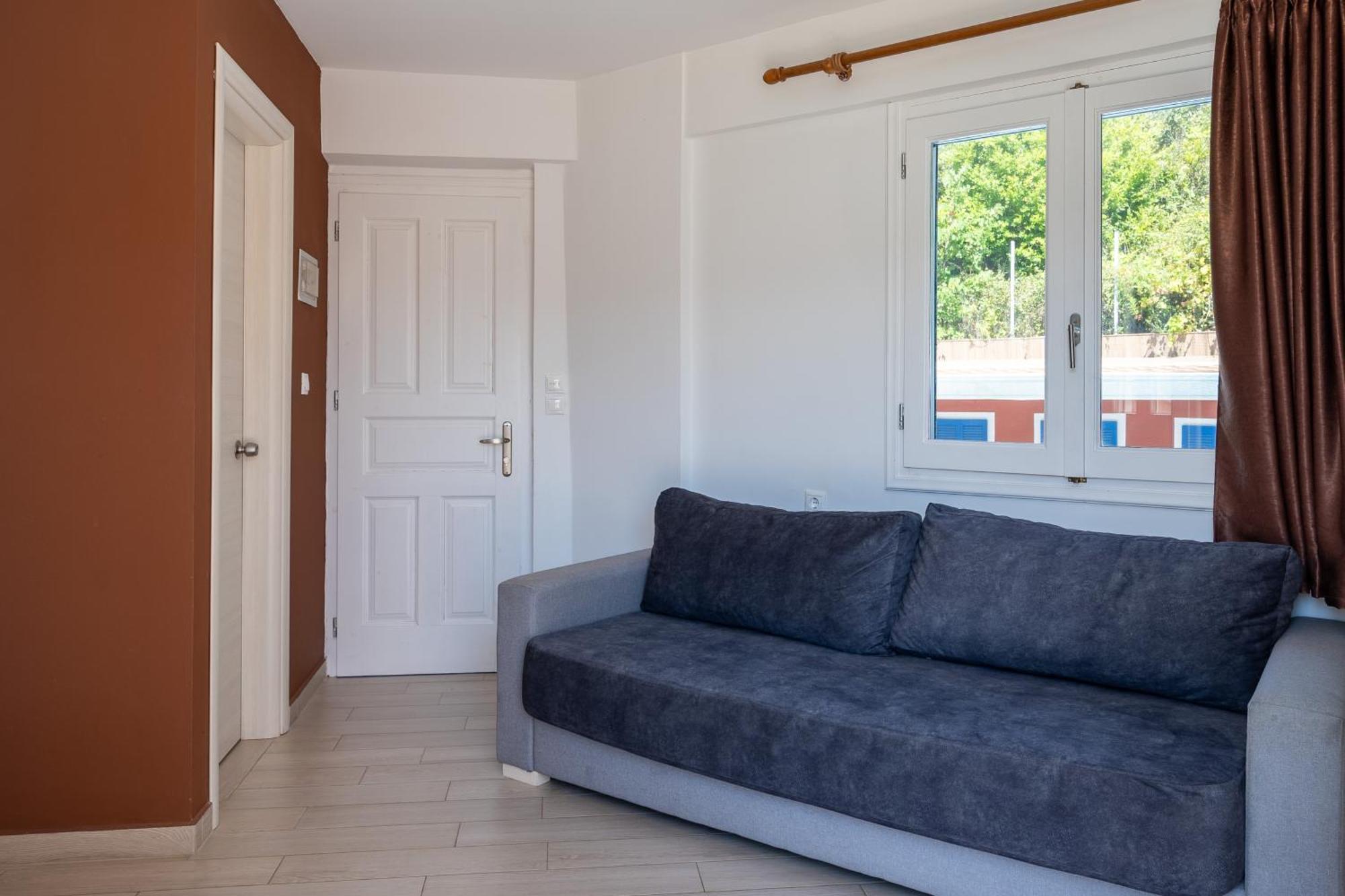 Vliho Bay Boutique Hotel Yénion Habitación foto