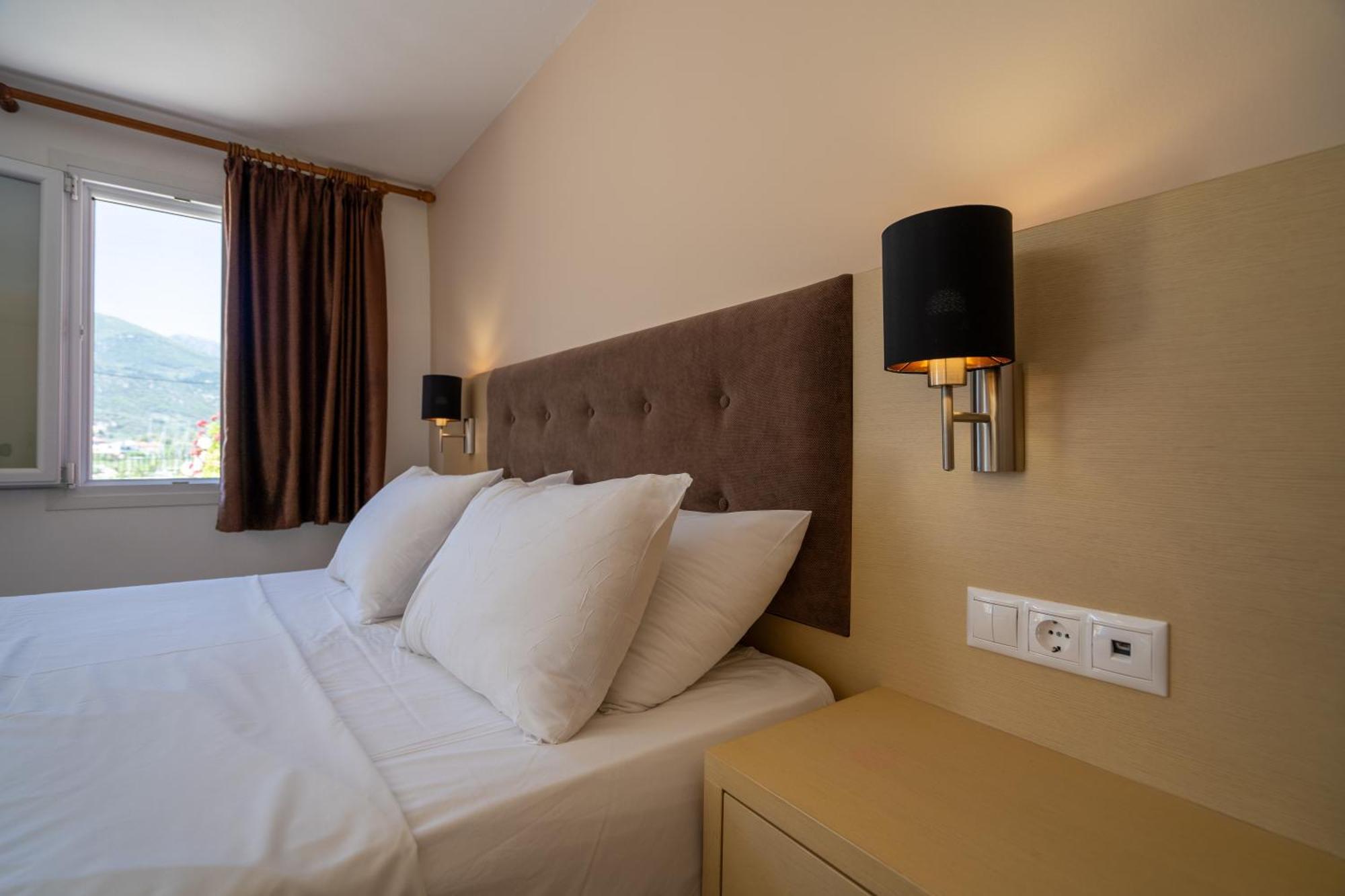 Vliho Bay Boutique Hotel Yénion Habitación foto